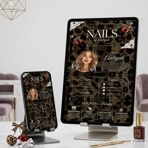 Puede incluir: Una tableta y un tel&eacute;fono inteligente en soportes muestran un sitio web para Nails by Aaliyah con fondo de estampado de leopardo, gr&aacute;ficos de cerezas y lazos, texto, un retrato y pol&iacute;ticas de reserva. Un esmalte de u&ntilde;as rojo oscuro est&aacute; cerca.