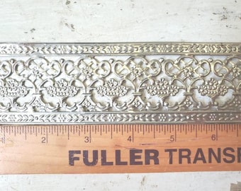 3 feet metal trim  Silvertone ornate floral motif , some rust possible, crown supply just under 2" wide