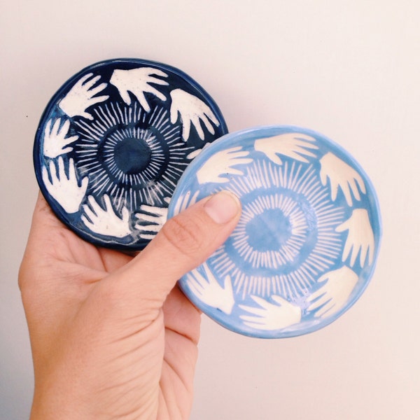 All Hands Dish: light blue and white and hands and lines 
