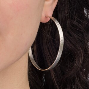 55 x 4mm handmade large 925 sterling silver hoop earrings | Hammered wavy texture, solid silver with matte, shiny finish | Handmade in USA