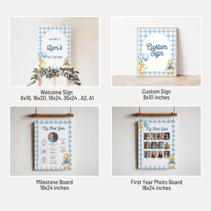 May include: A collection of baby shower signs and milestone boards. The signs feature a blue gingham pattern, duck illustrations, and text such as "Welcome to Liam's First Birthday" and "Custom Sign." The milestone boards are 18x24 inches.