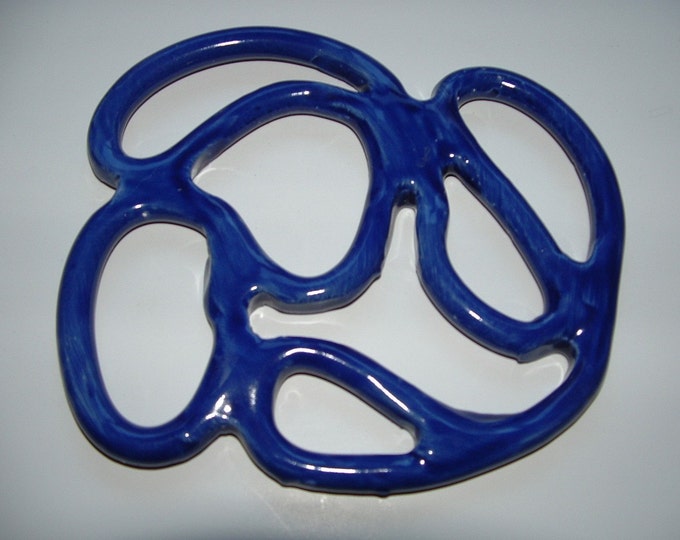Free formed Cobalt blue ceramic trivet