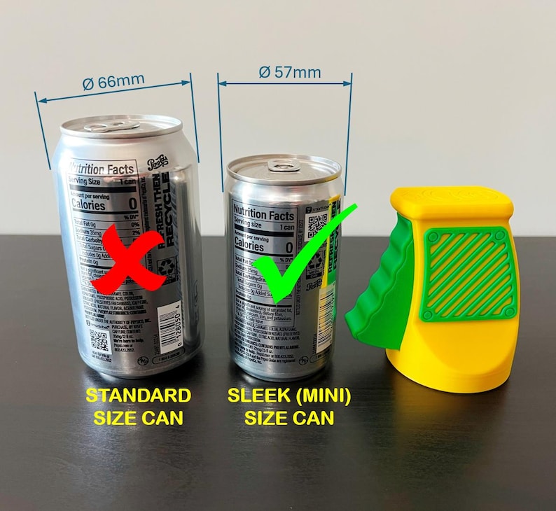 May include: Image showing a comparison of a standard size can (66mm diameter) and a sleek (mini) size can (57mm diameter). A yellow and green can opener is also present. The text reads "STANDARD SIZE CAN" and "SLEEK (MINI) SIZE CAN".