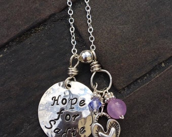 HOPE for SADIE Fund Raising Necklace for a Child with SMA features a hand stamped disc, a silver heart charm and Purple beads