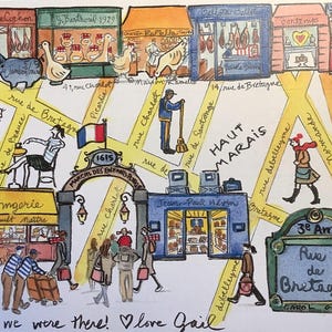 May include: A colorful illustrated map of the Haut Marais neighborhood in Paris, featuring street names like Rue de Bretagne, storefronts, pedestrians, and a March&eacute; des Enfants Rouges archway. The bottom text reads, Jill, we were there! love Gail.