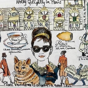May include: A watercolor illustration of a woman with sunglasses and a cat, surrounded by Parisian landmarks and shops. The text "Place Vend&ocirc;me is always a good idea" is written at the bottom of the image.