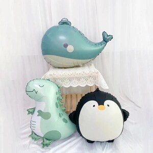 漫画風のかわいい風船、ペンギン、クジラ、恐竜、アルミフィルム風船、ペンギン風船、恐竜風船、クジラ風船、動物風船