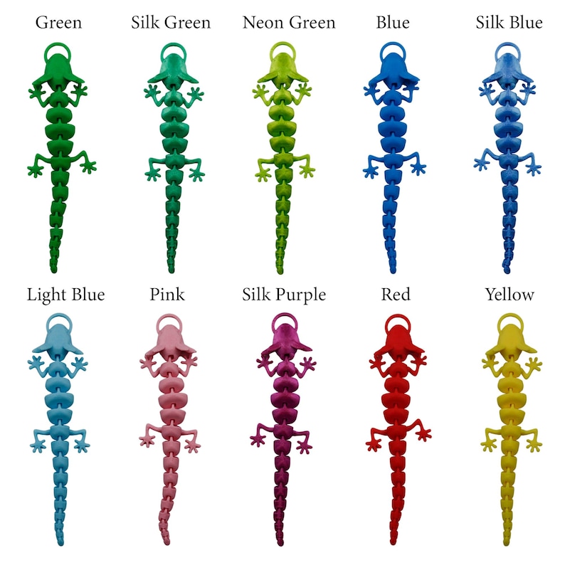 May include: Ten colorful lizard-shaped keychains in various colors, including green, blue, pink, purple, red, and yellow.