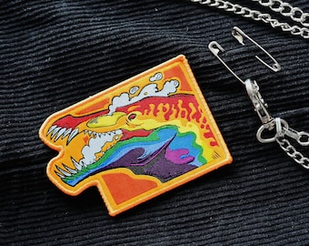 Dinosaur LGBTQ pride month flag iron-on woven patch: Lio-PRIDE-odon