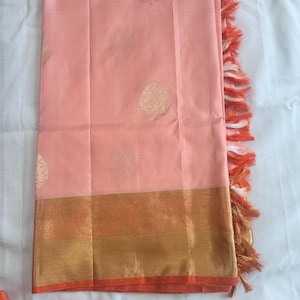 Light Pink Kanchipuram silk saree with orange border