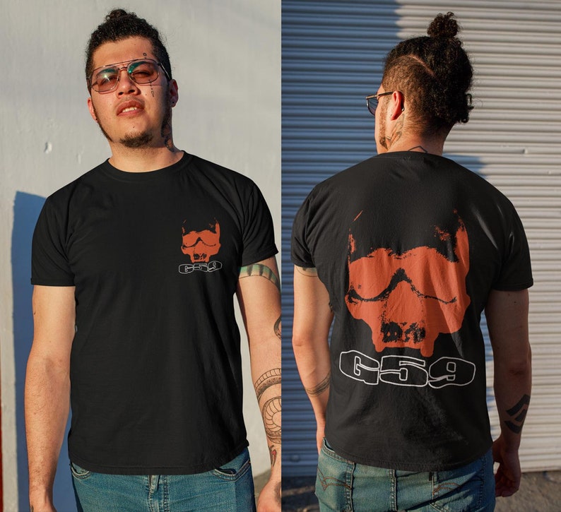 May include: Black t-shirt with a red skull graphic and the text "659" printed on the back.