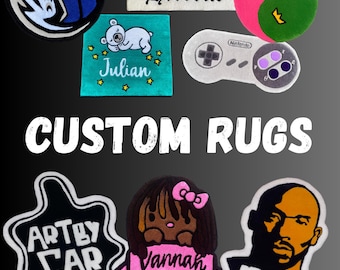 May include: A collection of custom rugs featuring various designs, including a basketball team logo, a sleeping bear, a video game controller, a yin yang symbol, a cartoon girl, a star with the words "Art by Car", and a portrait of a man with the number "24".