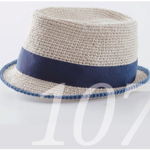 May include: A cream-colored crocheted hat with a blue ribbon and a blue crocheted trim.