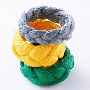 Knitting pattern for bangles. Homemade jewelry. Written in German with knitting instructions for beginners to advanced knitters.