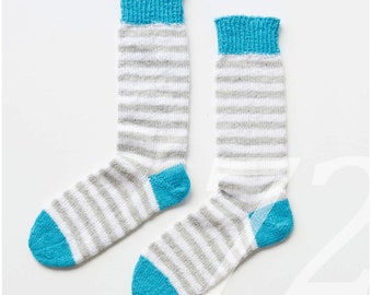 Sock knitting instructions for children and adults. Toe-up, wool socks knitted from the toes. Size 20 to 51 in German