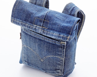 Sömnadsinstruktioner för en barnväska för styren tillverkad av återvunna jeans. För skotrar, cyklar och mopeder. PDF-instruktioner tillgängliga för omedelbar nedladdning på tyska.