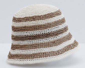 Virkmönster för hatt, cloche eller grythatt. Sommarhatt gjord av raffia eller pappersgarn. PDF-nedladdning på tyska.