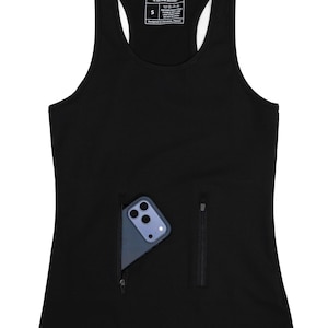 May include: Black athletic tank top with a racerback design. Features a zippered pocket on the front, holding a smartphone. The tank top has the brand name "SECURATEE" printed on the tag.