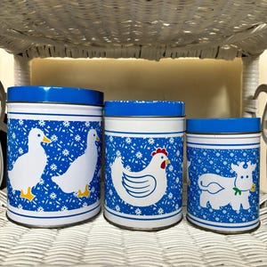 Farmhouse Chic Vintage Tin Nesting Cannister Set Duck Chicken Cow Decor Set of Three