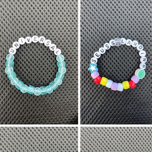 May include: Four beaded bracelets with different colored beads and white letter beads spelling out the words "UNIVERSAL", "SEUSS LANDING", "OWEN GRADY", and "MEGAMIND".