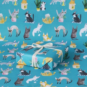 Naughty cats wrapping paper