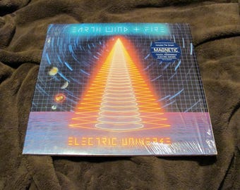 Earth Wind & Fire Lp "Electric Universe" 1983 w/hype sticker NM