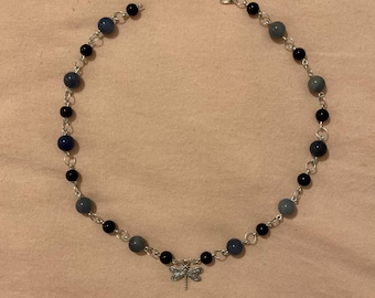 Collana con ciondolo ispirata a Coraline