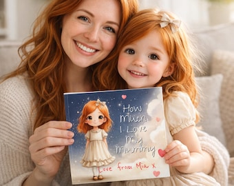 May include: A children's book titled "How Much I Love My Mummy" is held by a mother and daughter. The book cover features an illustration of a girl in a cream dress. The text is in a handwritten style, with a heart symbol.