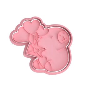 Sello y cortador de galletas con forma de carpincho con letras y globos