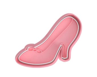 May include: Pink plastic cookie cutter shaped like a high-heeled shoe.