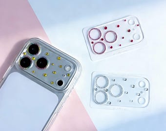 Pellicola protettiva per obiettivo iPhone 17 Pro Max con design 3D di strass e cristalli.