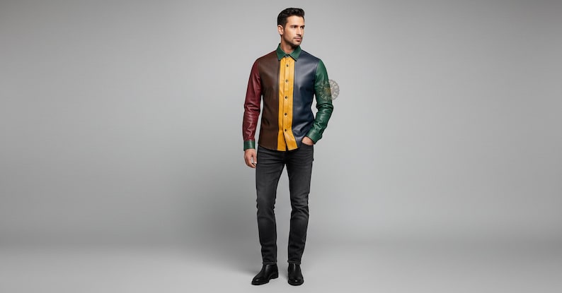 May include: A multi-colored leather shirt with long sleeves. The shirt features panels of burgundy, brown, yellow, navy, and green. The model is wearing black jeans and black boots.
