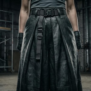 May include: Black wide-leg trousers featuring a high-waisted design with deep vertical pleats. The garment includes a black nylon webbing belt with a tactical-style quick-release buckle and an attached vertical strap with adjustable plastic sliders.