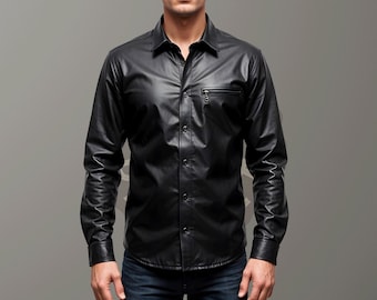 May include: A black leather long-sleeve shirt with a zippered pocket on the left chest.