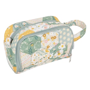 May include: A floral patterned cosmetic bag with a handle. The bag features a patchwork design with hexagonal shapes in yellow, green, and white. The bag has a zipper closure and a light blue trim. The design includes bees and floral patterns.