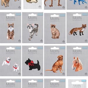 May include: A selection of iron-on and sew-on fabric patches with animal motifs. The patches depict a pug, hedgehog, dinosaur, cat, fox, dog, horse, butterfly, sloth, and turtle. Each patch is on a grey backing with the word "Motifs".