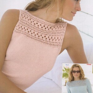 May include: A sleeveless pink crocheted top with a delicate lace trim around the neckline. The top is made of a soft, lightweight yarn and has a relaxed fit.