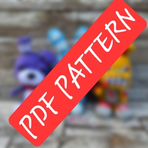 May include: Three plush toys in purple, blue, and yellow colors, each featuring long ears and a rounded head. A red diagonal banner across the image displays the white text PDF PATTERN. The toys have distinct facial features and limbs.