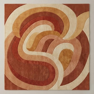 May include: A square rug with a swirling, abstract design in shades of red, orange, beige, and cream. The rug's pattern features curved lines and shapes, creating a retro, mid-century modern aesthetic. The rug is made of a soft, plush material.