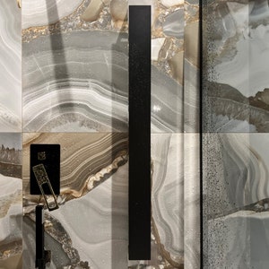 Elegant black vertical shelf. Stainless steel wall mounted shelf. Modern floating shelf for bathroom. Bathroom shelving.