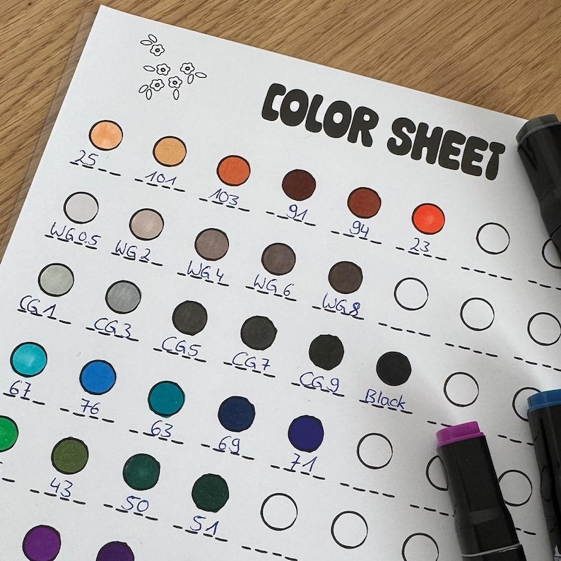 May include: A color sheet with a grid of numbered circles, each filled with a different color. The colors are arranged in rows, with the first row being shades of brown, the second row being shades of gray, the third row being shades of blue, the fourth row being shades of green, and the fifth row being shades of purple. The sheet is labeled "COLOR SHEET" at the top.