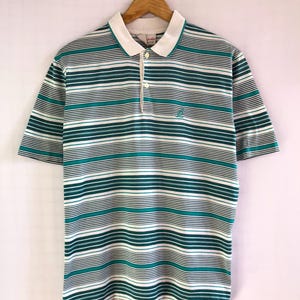 Polo australiano vintage | Turquesa y blanco | Camiseta a rayas de los años 80/90, corte recto, logo bordado, Italia, estilo urbano, unisex, talla M