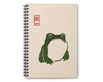 Cuaderno espiral con líneas de rana japonesas, inspirado en el arte minimalista de Matsumoto Hoji, con ilustraciones en tinta para escritores y artistas.