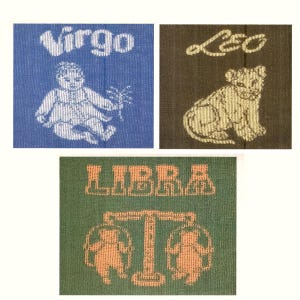May include: Three knitted squares with zodiac signs. The first square is blue with the word "Virgo" and a white baby. The second square is brown with the word "Leo" and a white lion. The third square is green with the word "Libra" and two white figures on a scale.