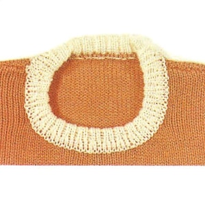 May include: A knitted sweater with a white trim around the neckline. The sweater is a light orange color.