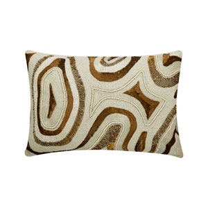 May include: A decorative throw pillow with a white background and a brown abstract pattern. The pattern is made up of curved lines and shapes that resemble a topographic map.