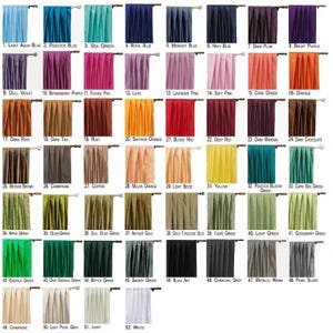 May include: A chart of 52 different colors of fabric swatches. Each swatch is a different shade of color, from light aqua blue to white. The swatches are arranged in rows and columns, and each swatch is labeled with a number and a color name.