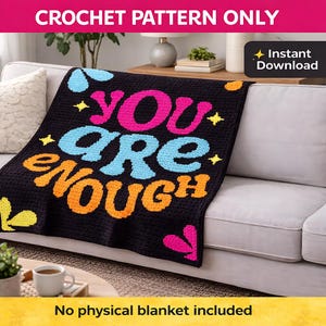 May include: Black crochet blanket with the words "YOU ARE ENOUGH" in bright pink, blue, and orange. The blanket has flower and star accents. The text "CROCHET PATTERN ONLY" and "Instant Download" are also visible.