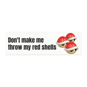 May include: A white rectangle with the text "Don't make me throw my red shells" in black. Three red turtle shells with white trim and yellow faces are to the right of the text.