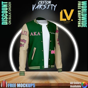Puede incluir: Una chaqueta de béisbol verde y beige con las letras "AKA" en la parte delantera y "Spretty Girl" en la manga. La chaqueta tiene una camiseta blanca y una cremallera dorada.